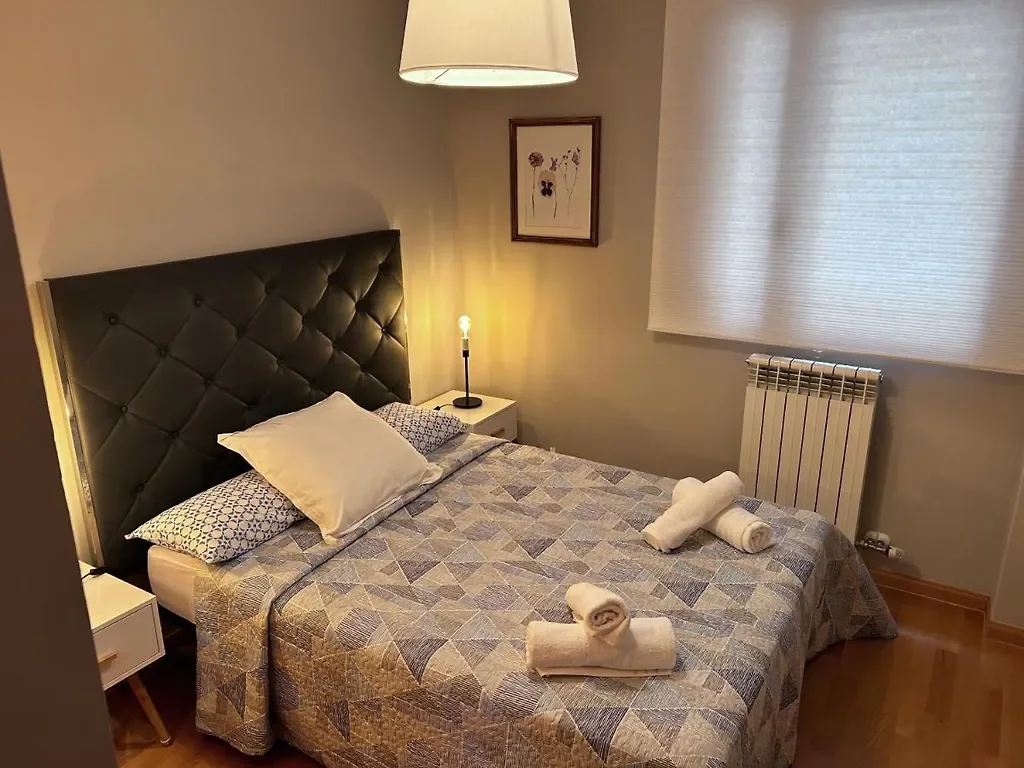 Dormitorio con cabecero capitoné